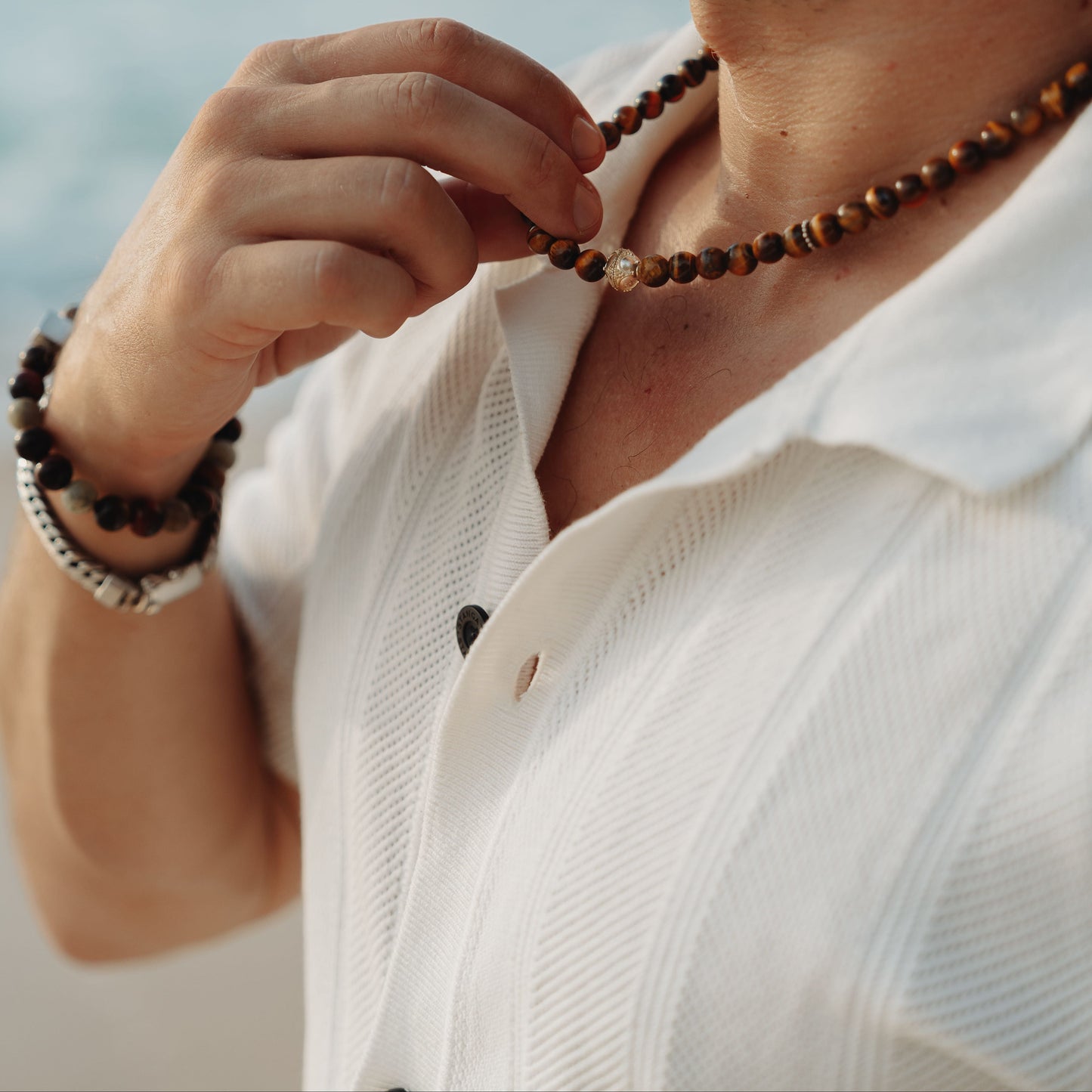 Tiger Legacy Necklace – mens tiger eye necklace worn by the ocean | Stone N Luxe